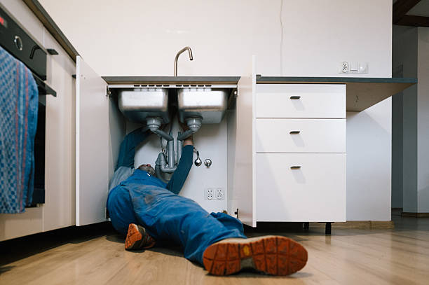 Professional Plumbing technician working in Plainville, CT
